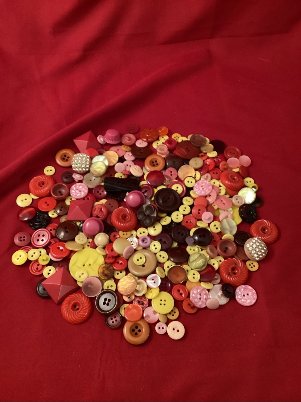 224 grams of Assorted Buttons in Red, Pink, Yellow